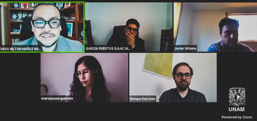 Captura de maestros discutiendo sobre migración y desarrollo